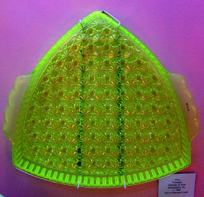 Uranium-infused glass under black light.